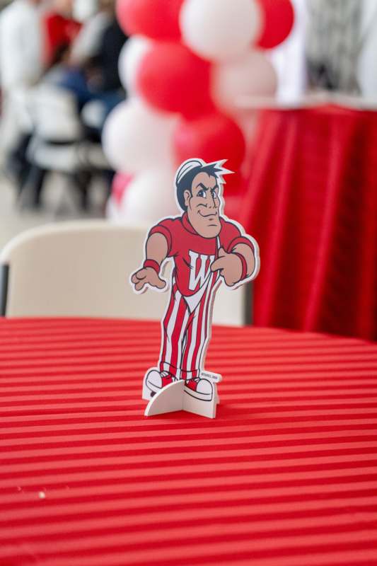 a paper cutout of a man on a table