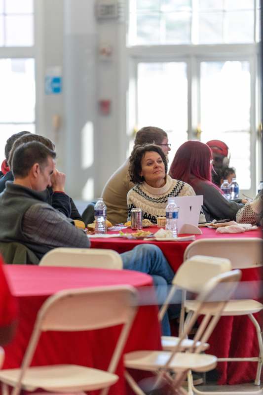 a group of people sitting at a table