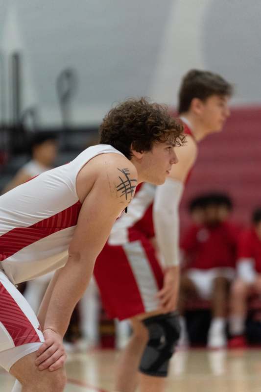 a man in a basketball uniform