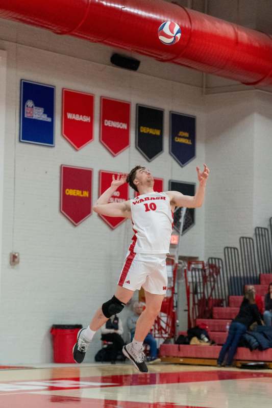 a man in a uniform jumping in the air
