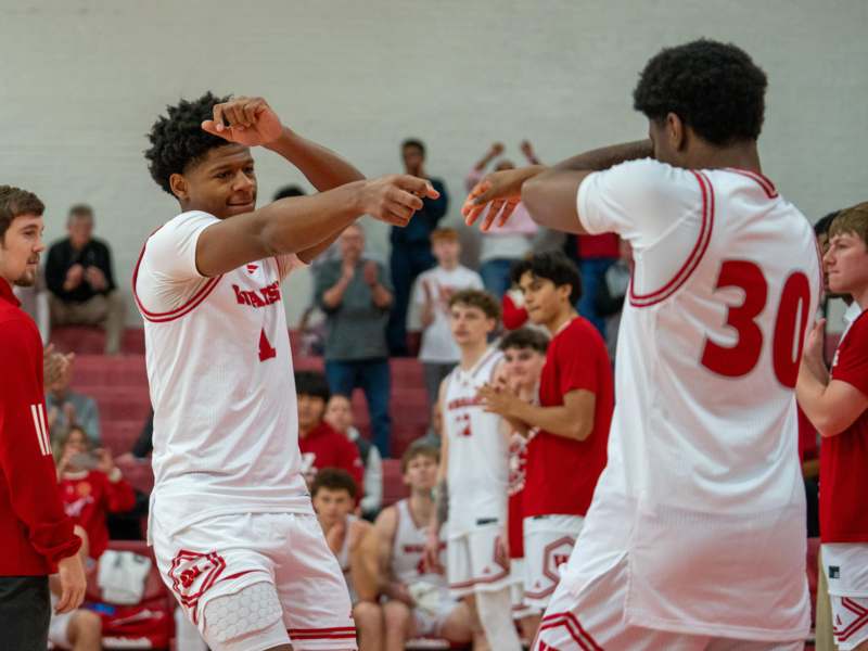 a group of men in white uniforms