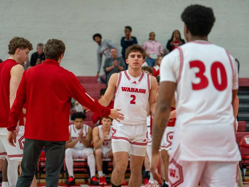a group of men in a basketball game