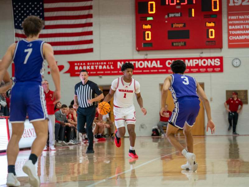 a group of people playing basketball