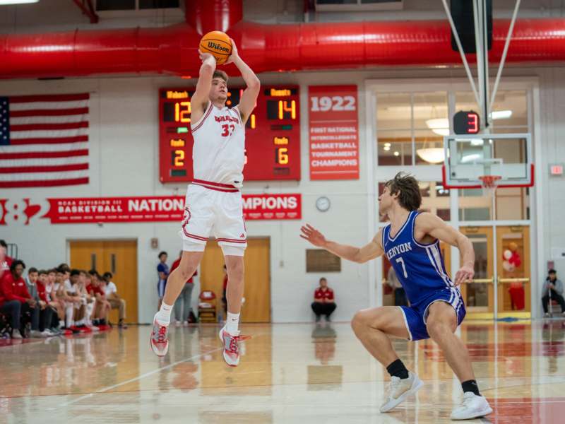 a basketball player in the air
