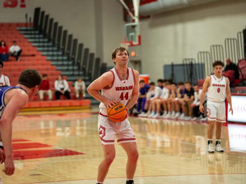 a man holding a basketball