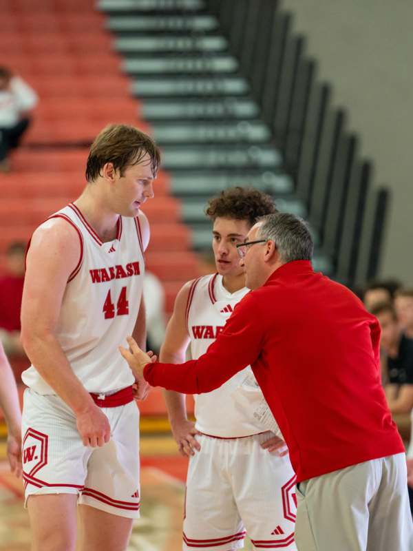 a group of men in basketball uniforms