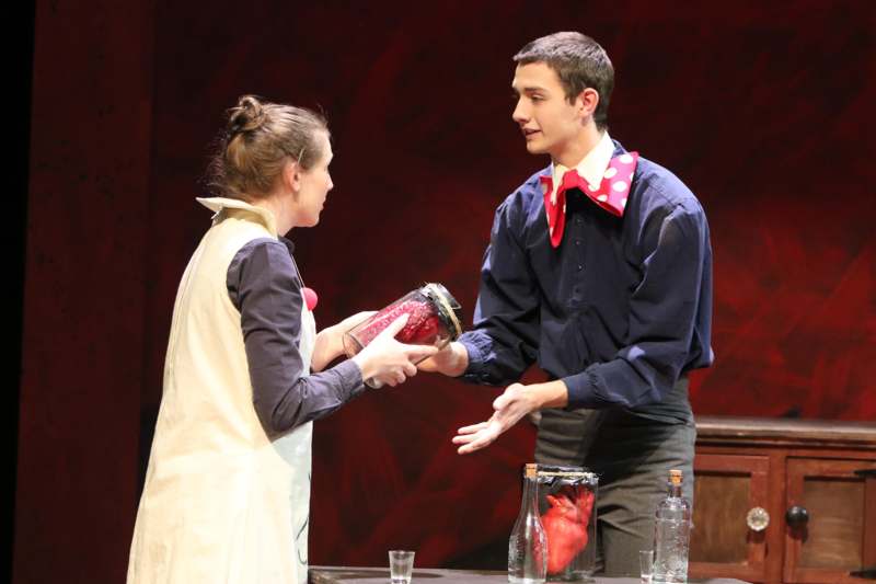 a man and woman on stage