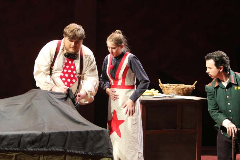 a man and woman in aprons