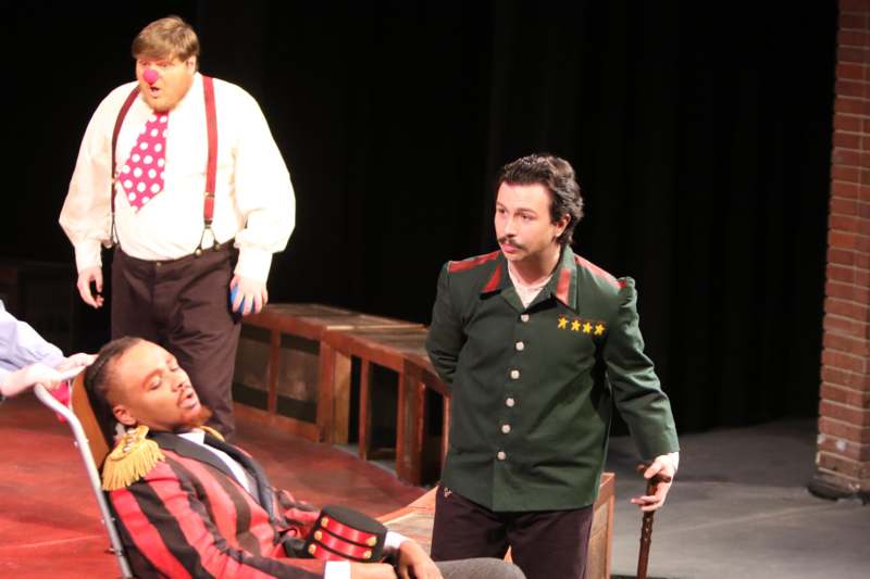 a group of men on a stage