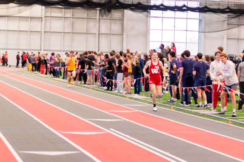 a group of people on a track