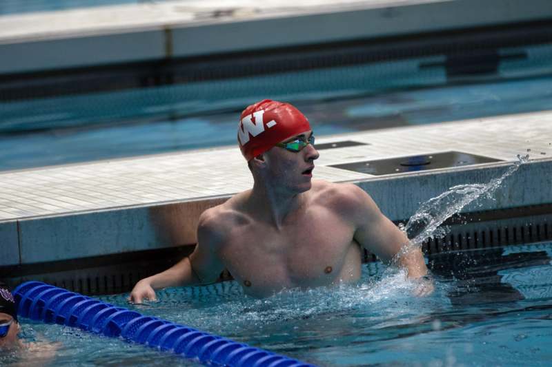 a man in a swimming pool