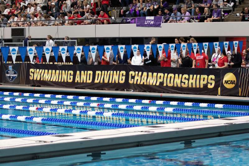a swimming pool with a banner