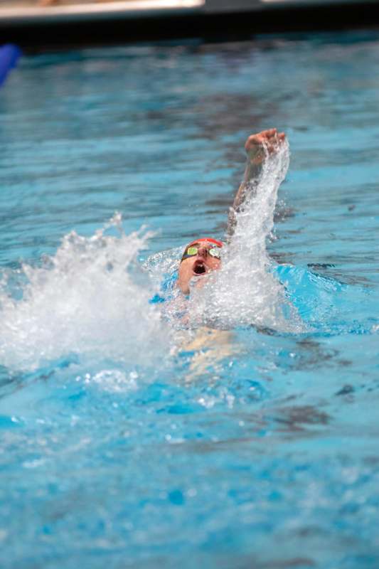 a person swimming in a pool