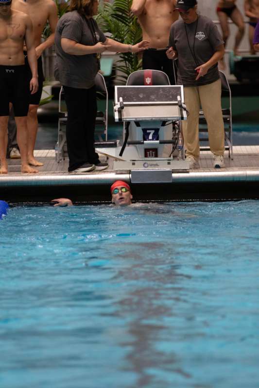 a man in a swimming pool
