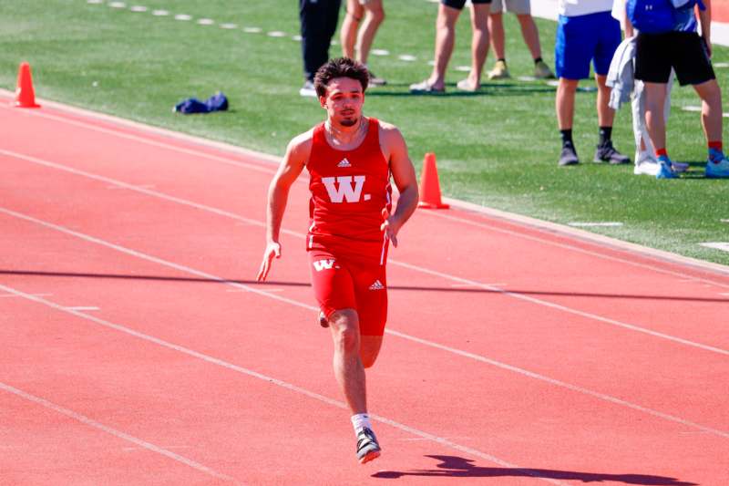 a man running on a track