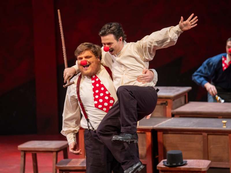 a man carrying a man on his back