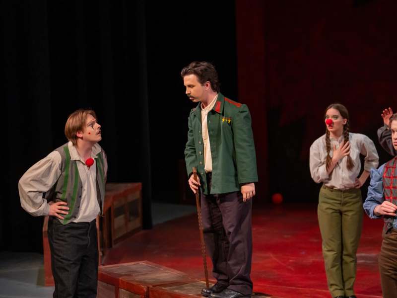 a group of people on a stage