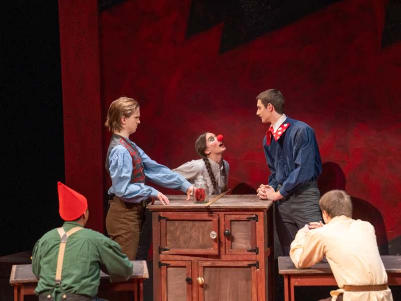 a group of people on a stage