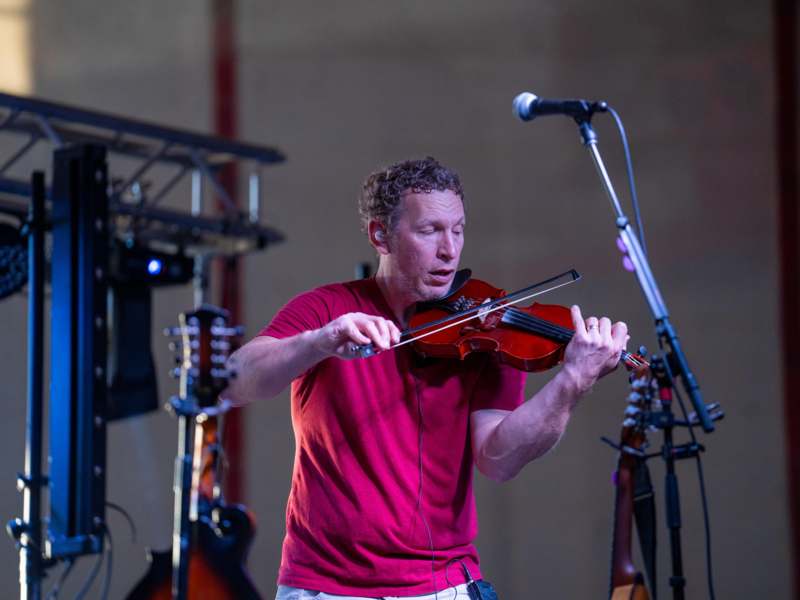 a man playing a violin