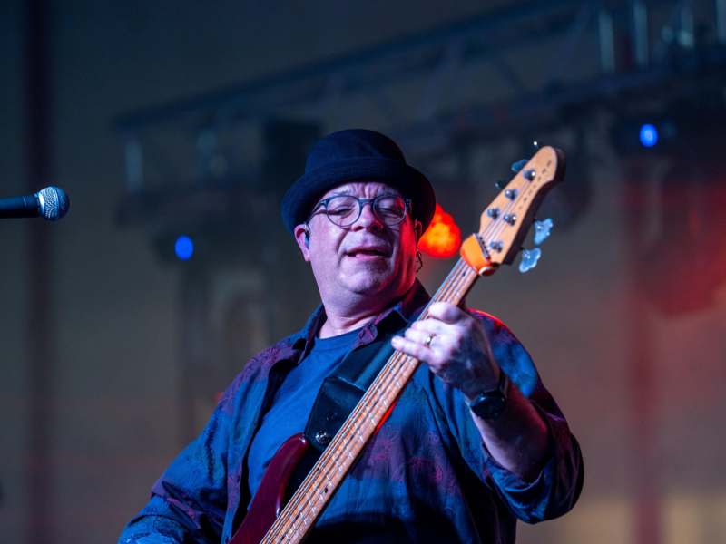 a man playing a guitar