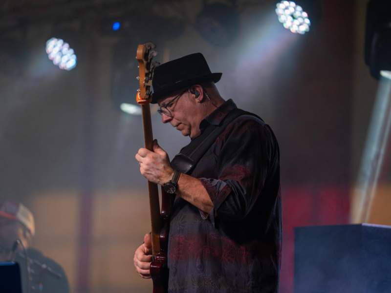 a man playing a guitar