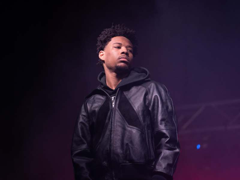 a man in a black jacket