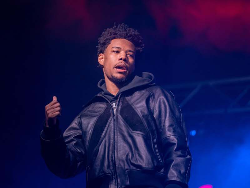 a man in a black jacket