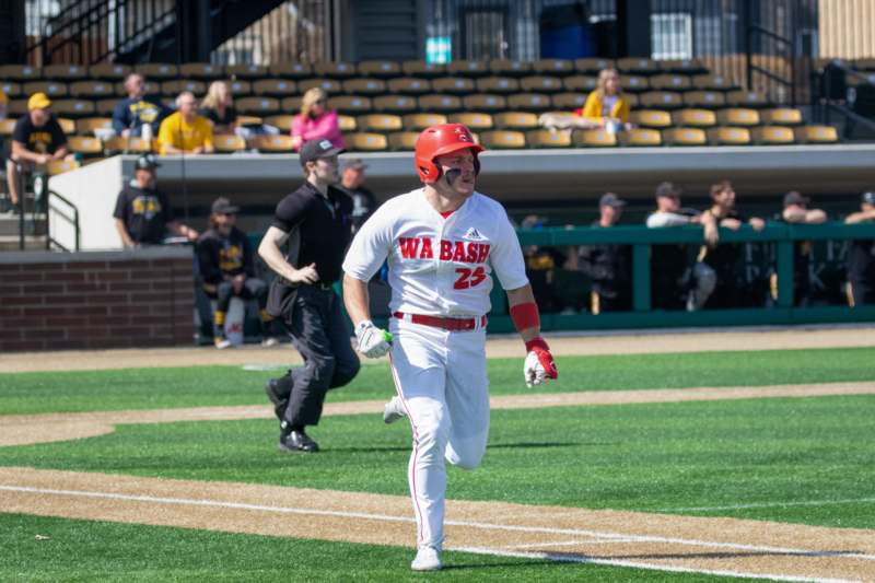 a baseball player running on a field