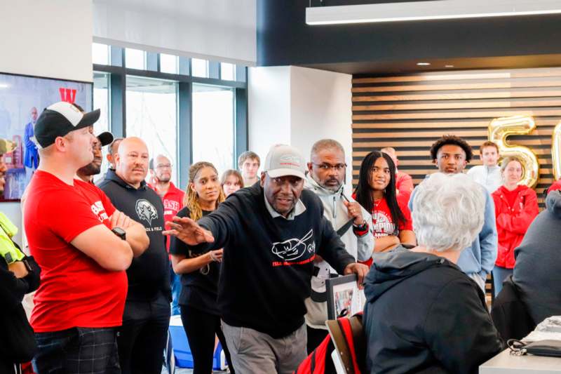 a group of people standing in a room