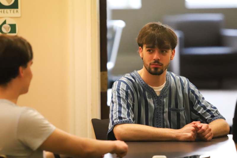 a man sitting at a table