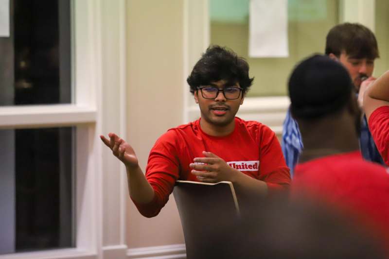 a man in a red shirt