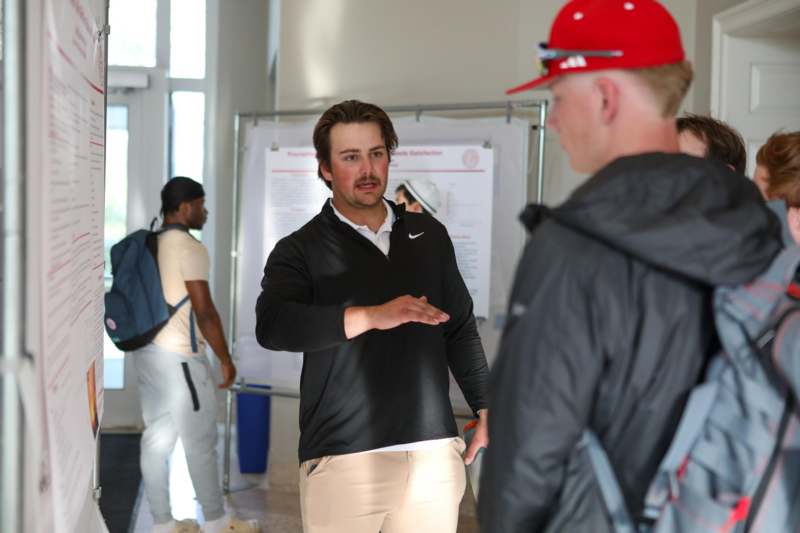 a man talking to a man