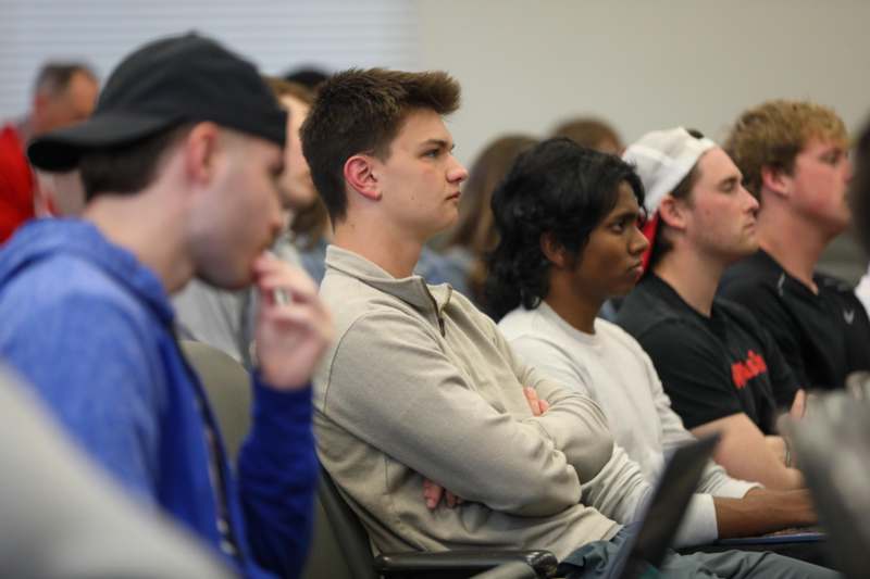 a group of people sitting in a room