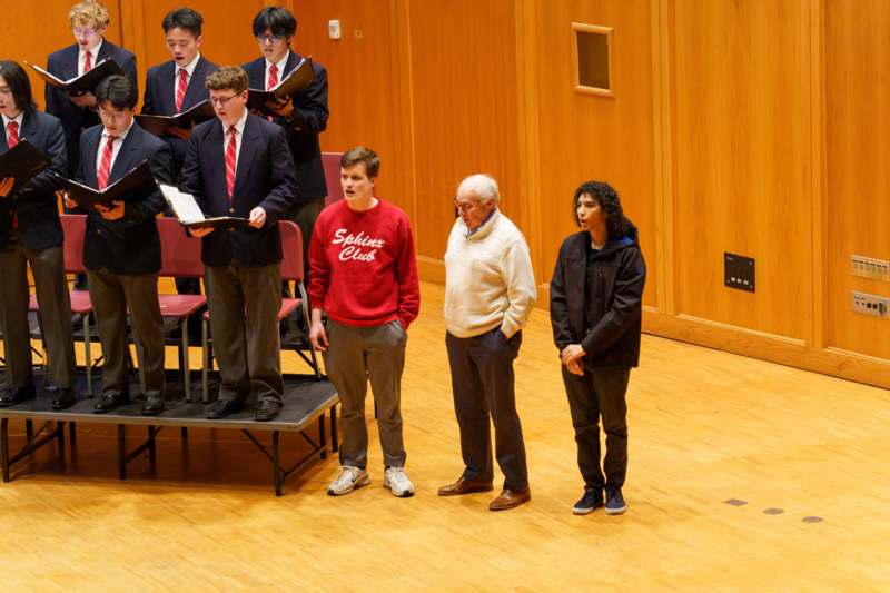 a group of people standing on a stage
