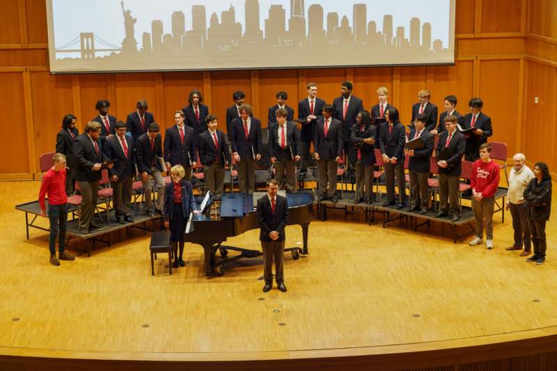 a group of people standing on a stage