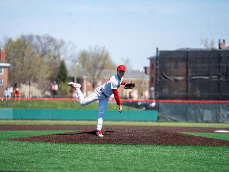 a baseball player throwing a ball