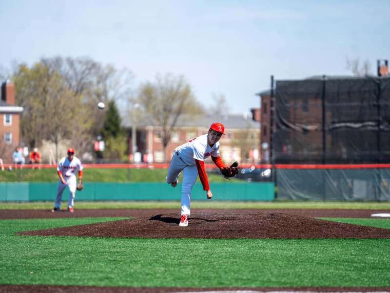 a baseball player throwing a ball