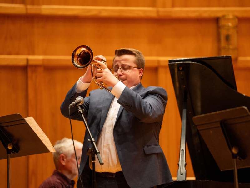 Jazz Ensemble Concert 2026 - a man playing a trumpet