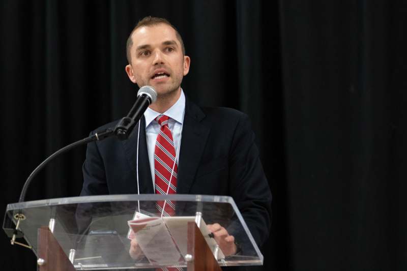 a man speaking into a microphone