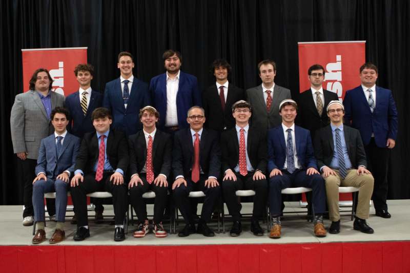 a group of people posing for a photo