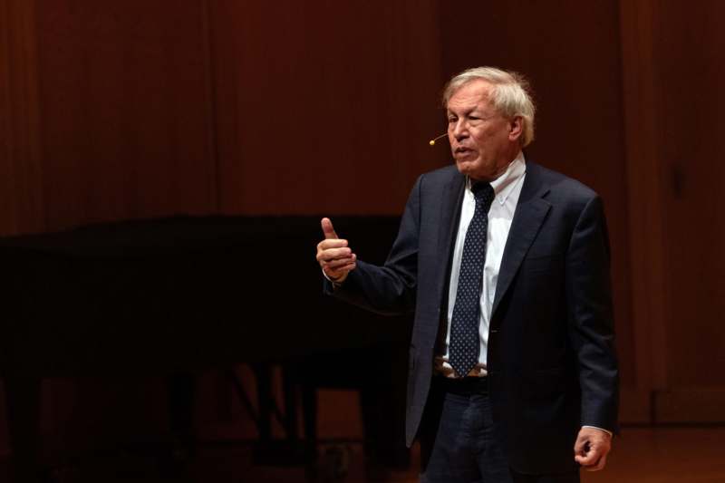2026 David W. Peck Lecture and Dinner - a man in a suit and tie holding his thumb up