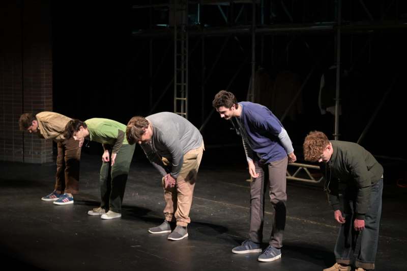 a group of men on a stage