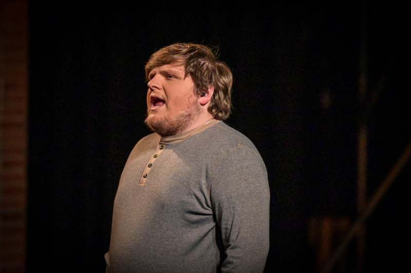 a man with his mouth open