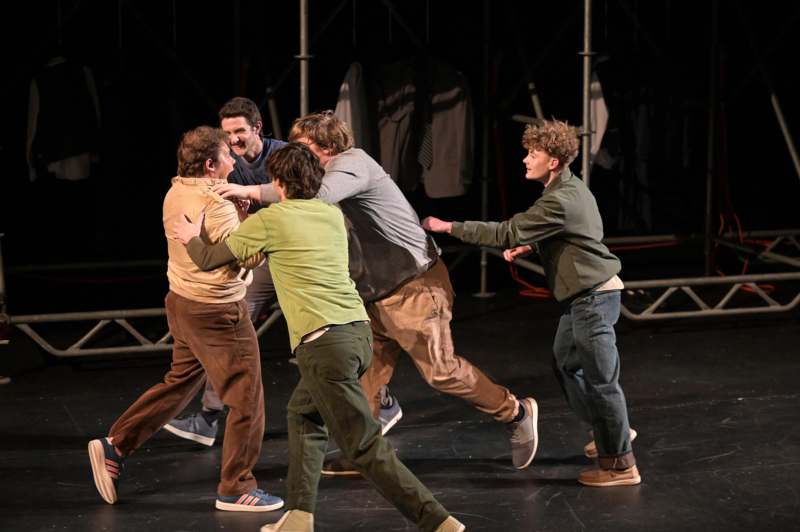 a group of men on a stage