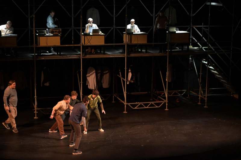 a group of men on a stage