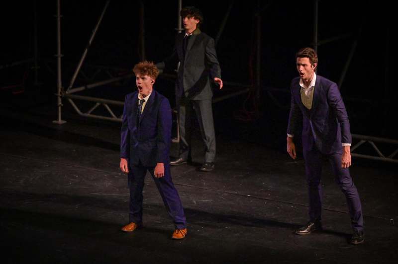 a group of men on a stage