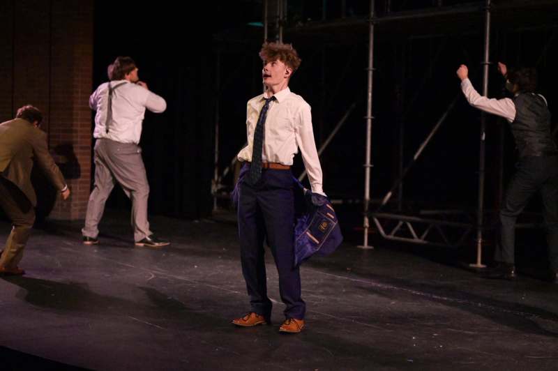 a group of men on a stage