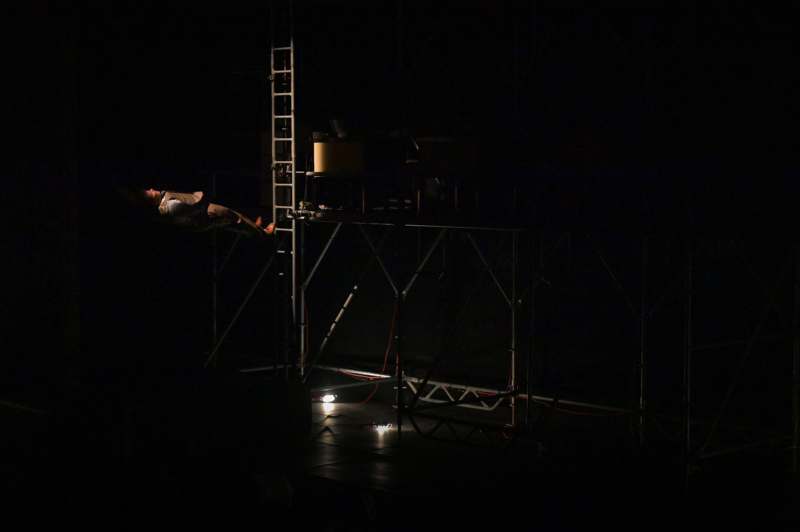 a man falling off a metal structure