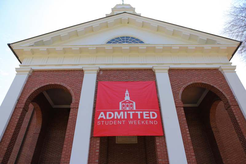 Admitted Student Weekend-2026 - a red banner on a brick building