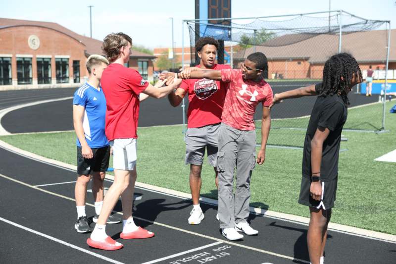 a group of people on a track